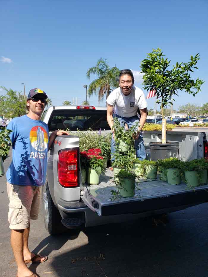 Loading up plants destined for the Butterfly Garden with Aaron Evens